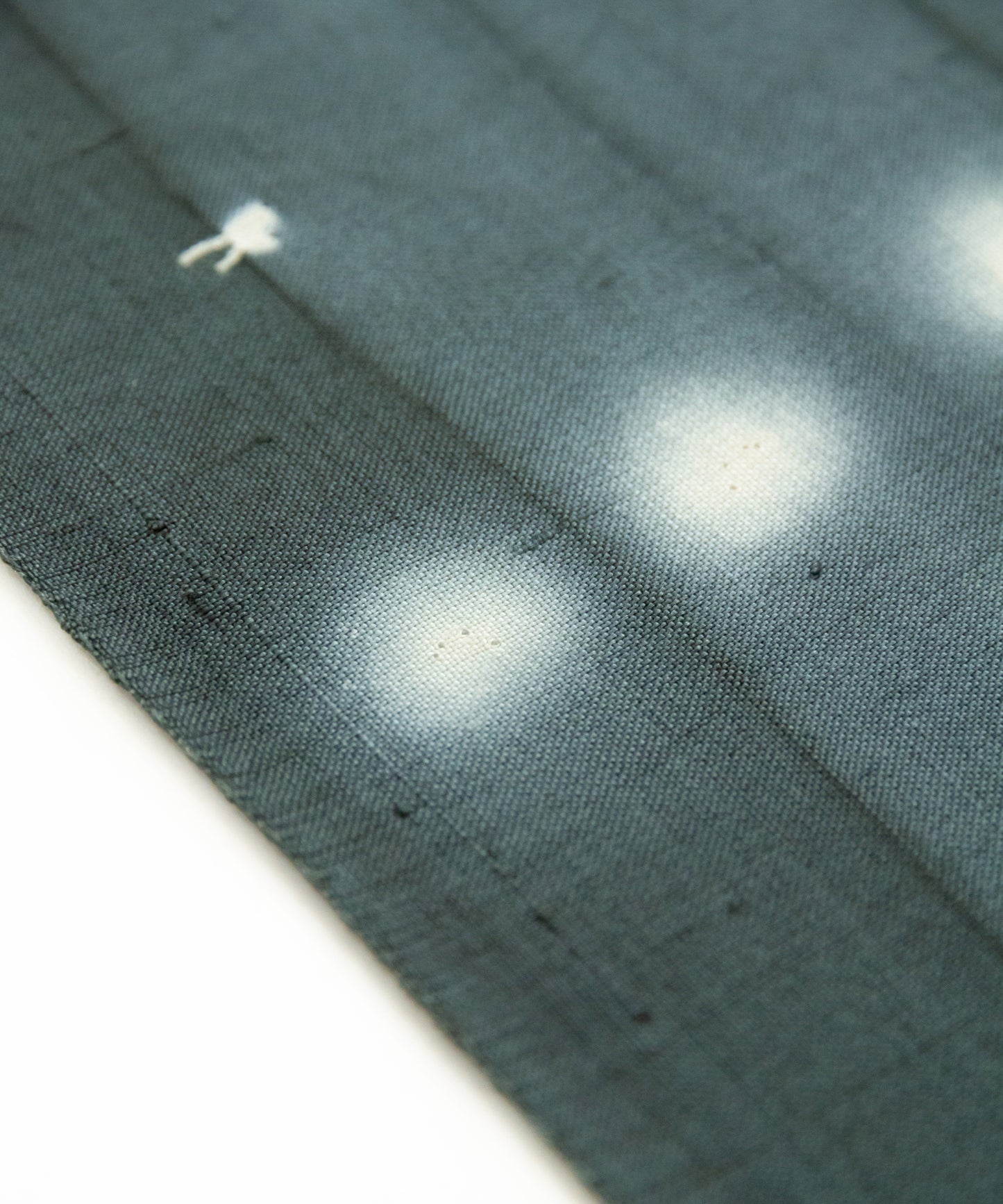 しょうざん生紬着尺「ほたる絞り くすんだ青緑」